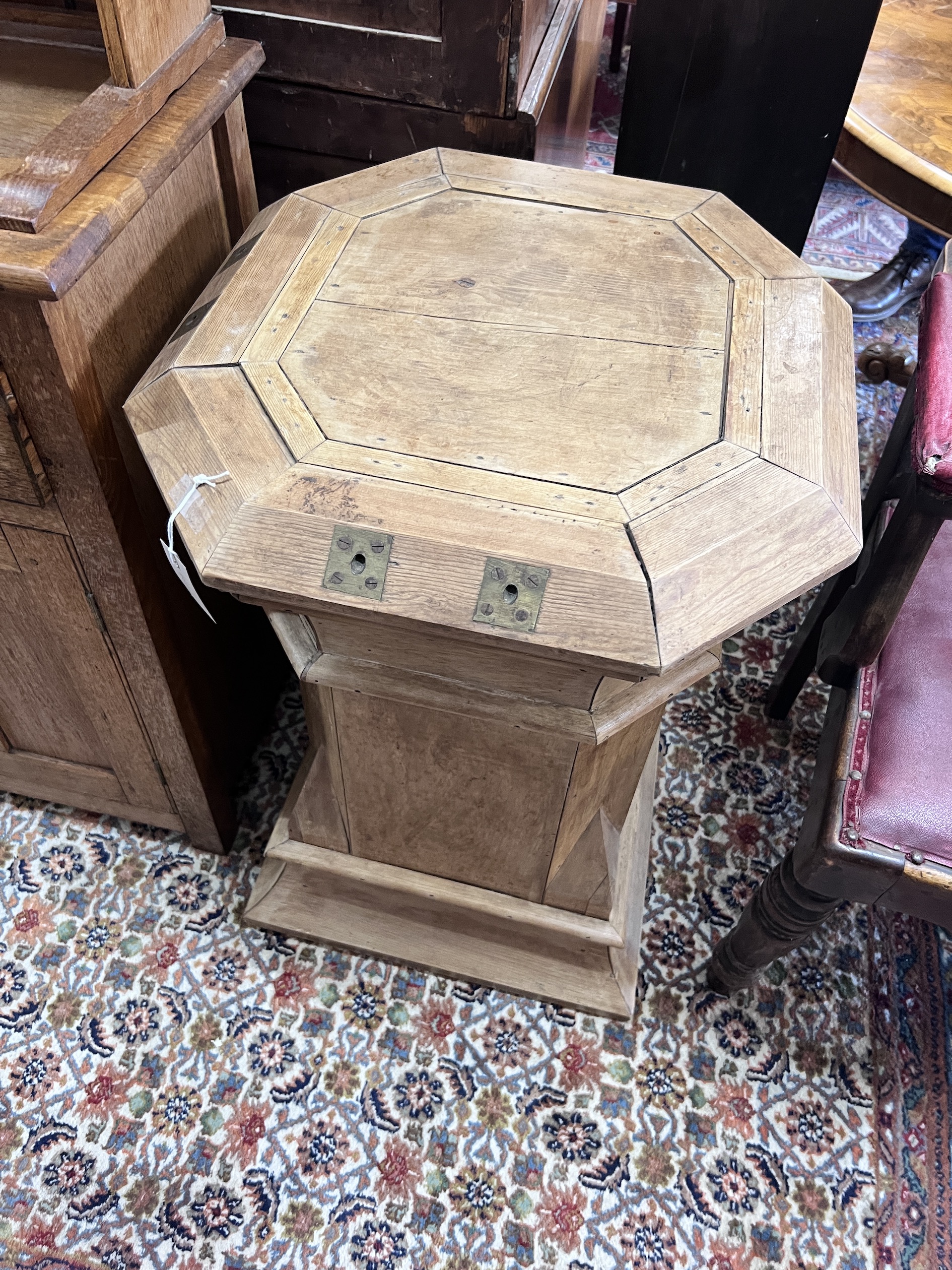 A 19th century Gothic pine octagonal plinth, width 54cm, height 77cm